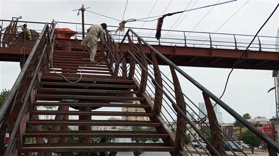 pedestrians and general public, on  Pedestrian Bridge are being fabricated and installed at Boat Basin.